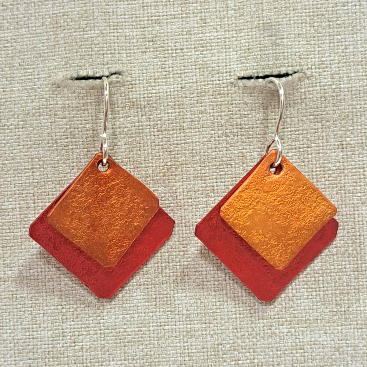 Boucles percées Losanges pm orange et rouge OANA MILLET