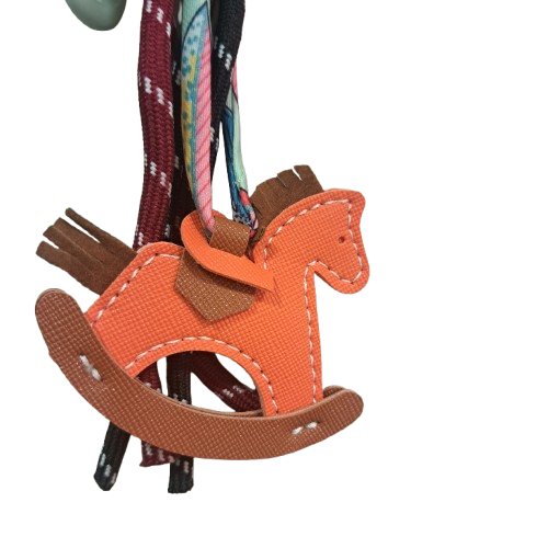 Porte clefs Cheval à bascule orange