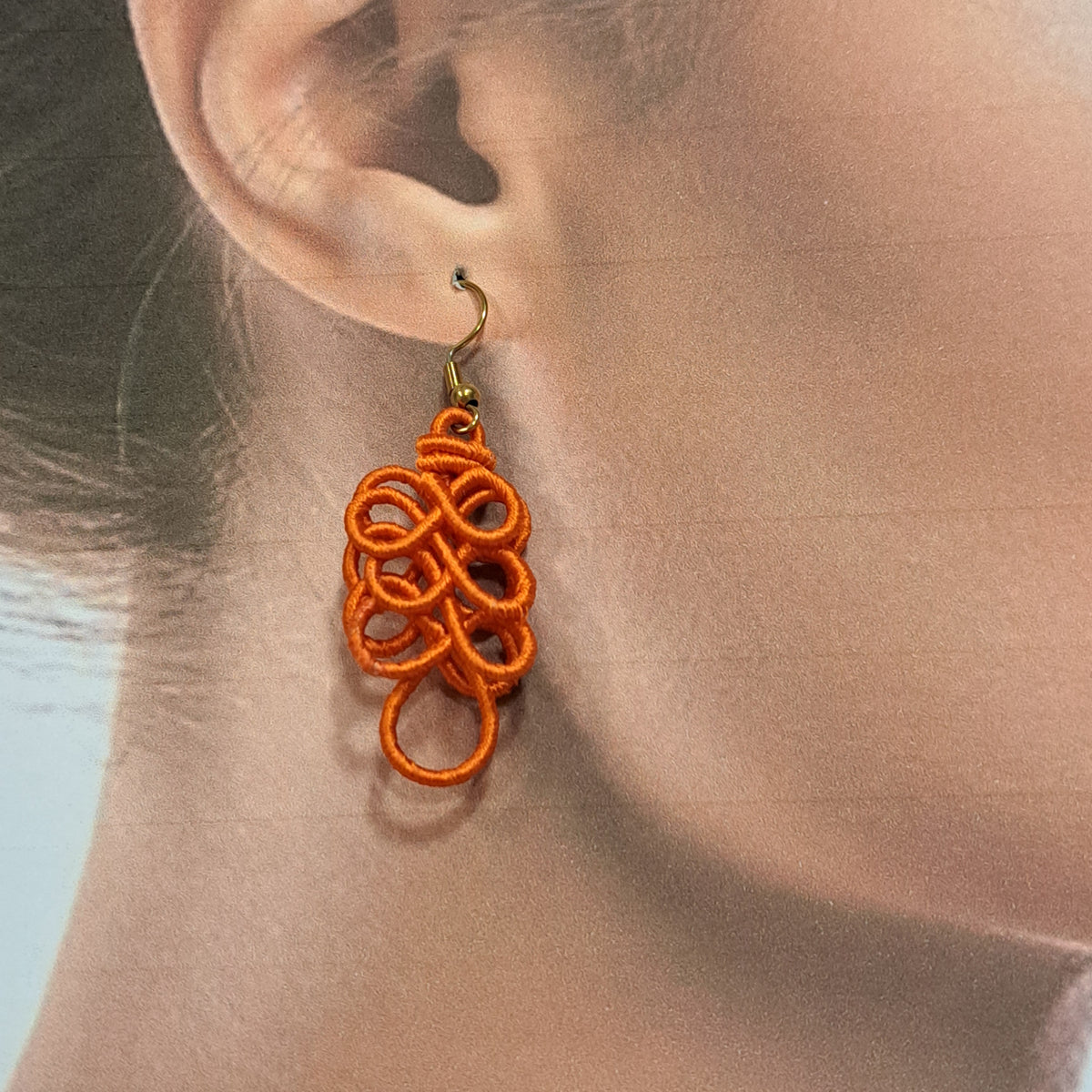 Boucles percées Assane orange NAF BIJOUX