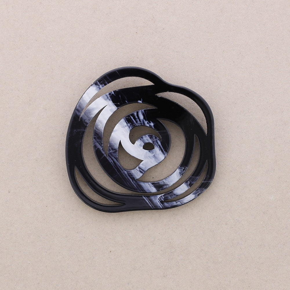 Broche Rose ajourée noir Fancy F